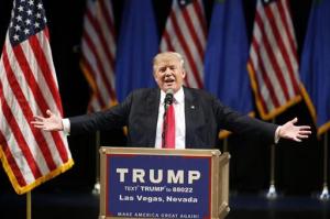 In this June 18, 2016, photo, Republican presidential candidate Donald Trump speaks at the Treasure Island hotel and casino in Las Vegas. In his businesses and presidential campaign, Trump requires nearly everyone to sign legally binding nondisclosure agreements prohibiting them from releasing any confidential or disparaging information about the real estate mogul, his family or his companies. (AP Photo/John Locher)