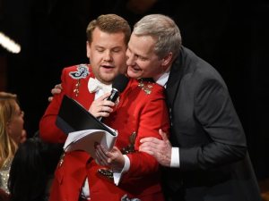 Host James Corden, left, and actor Jeff Daniels sing "The Sound of Music" together at the Tony Awards at the Beacon Theatre on Sunday, June 12, 2016, in New York. (Photo by Evan Agostini/Invision/AP)
