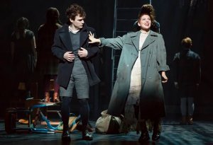 In this image released by Boneau/Bryan-Brown, Daniel N. Durant, left, and Krysta Rodriguez appear during a performance of "Spring Awakening," in New York. Creators of the Tony nominated revival have turned to Kickstarter to raise $200,000 so the cast can perform at the Tony Awards. Its up the shows themselves to pay the costs of performing on awards night. (Joan Marcus/Boneau/Bryan-Brown via AP)