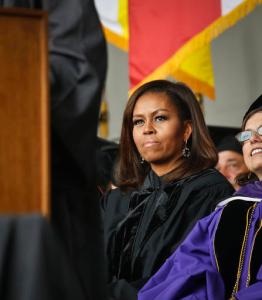 First lady Michelle Obama listens during commencement ceremony for City College of New York, Friday June 3, 2016. Obama delivered the keynote address to more than 3,000 CCNY students in the final commencement speech as first lady. (AP Photo/Bebeto Matthews)
