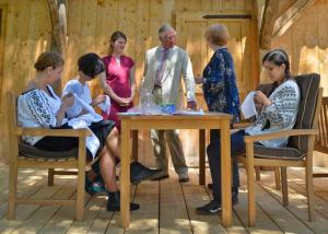 Britain's Prince Charles listens to a trainer presenting a traditional sewing class in the Transylvanian village of Viscri, Romania, Wednesday, June 1, 2016, during the opening of a training center to encourage conservation, farming and sustainable development in Romania. Charles, who has long been enamored of Romania's rural traditions, opened the "The Prince of Wales's Training Centre", which will bring skills and knowledge to rural communities.(AP Photo/Andreea Alexandru) ROMANIA OUT