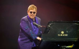 FILE - In this May 26, 2016 file photo, musician Elton John performs during a show, in Tel Aviv. John, Ricky Martin and Melissa Etheridge are among the gay artists using their voices to respond to the mass shooting at a Florida nightclub. John said during a concert in Liverpool, England, on Tuesday, June 14, that the wave of support for those killed and wounded in Sundays shooting in Orlando proves that were winning the fight against prejudice. (AP Photo/Dan Balilty, File)