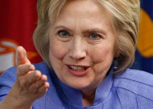 CORRECTS LOCATION TO VIRGINIA AIR AND SPACE CENTER FROM VIRGINIA AIR AND SPACE MUSEUM  - Democratic Presidential candidate Hillary Clinton gestures during a panel discussion on national security, Wednesday, June 15, 2016, at the Virginia Air and Space Center in Hampton, Va. (AP Photo/Steve Helber)