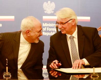 Polish Foreign Minister Witold Waszczykowski, right, talks with Iran's Foreign Minister Mohammad Javad Zarif during their meeting in Warsaw, Poland, Sunday, May 29, 2016. (AP Photo/Czarek Sokolowski)