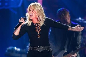 FILE - In a Saturday, April 30, 2016 file photo, Miranda Lambert performs during the 2016 iHeartRadio Country Festival held at Frank Erwin Center, in Austin, Texas. Lambert announced Wednesday, May 25, 2016, that she is closing her Pink Pistol clothing boutique in Tishomingo, Ok., where she and her ex-husband, Blake Shelton, once shared a home. She says Pink Pistol will reopen later this summer in her hometown of Lindale, Texas. (Photo by John Salangsang/Invision/AP, File)