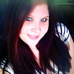 This undated photo provided by Diana Schalow shows her daughter Angela Russo. Schalow says her daughter had recently revived an online dating profile in search of fairy tale romance, but was instead lured to an apartment by a man now accused of killing her and leaving the body in a shallow desert grave. Police found 24-year-old Angela Russo's body five weeks after police say she exchanged text messages and then rendezvoused with Lashawn Johnson.(Courtesy Diana Schalow via AP)