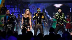 FILE - In this April 2, 2011 file photo, The Black Eyed Peas perform at Nickelodeon's 24th Annual Kids' Choice Awards in Los Angeles. Black Eyed Peas are reuniting after a five-year hiatus for a new rendition of their song "Where Is The Love?" aimed at ending gun violence. (AP Photo/Matt Sayles, File)