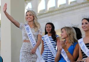 Miss Kentucky, Laura Jones waves as she is introduced during Miss America Pageant arrival ceremonies Tuesday, Aug. 30, 2016, in Atlantic City. The contestants from all 50 states, the District of Columbia and Puerto Rico appeared at the traditional welcoming ceremony across from Boardwalk Hall. (AP Photo/Mel Evans)