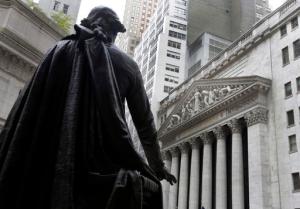 FILE - In this Oct. 2, 2014, file photo, the statue of George Washington on the steps of Federal Hall faces the facade of the New York Stock Exchange. Stocks are opening moderately higher on Wall Street, Monday, Aug. 29, 2016, as the market comes off three days of losses. (AP Photo/Richard Drew, File)