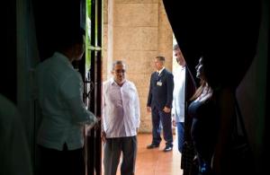 Commander of the Revolutionary Armed Forces of Colombia or FARC, Rodrigo Londono, better known as Timochenko or Timoleon Jimenez arrives at a press conference in Havana, Cuba, Sunday, August 28, 2016. The commander of Colombia's biggest rebel movement says its fighters will permanently cease hostilities with the government beginning with the first minute of Monday, as a result of their peace accord for ending five decades of war.(AP Photo/Ramon Espinosa)