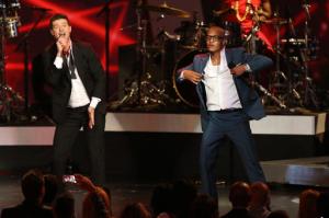 FILE- In this Dec. 6, 2013, file photo, Robin Thicke, left, and T.I. perform "Blurred Lines" at the Grammy Nominations Concert Live! at the Nokia Theatre L.A. Live in Los Angeles. More than 200 musicians filed a brief with the Ninth Circuit Court of Appeals on Tuesday, Aug. 30, 2016, to express concern about the ruling last year in a case brought by the children of Marvin Gaye, who sued for copyright infringement claiming "Blurred Lines" copied Gaye's hit "Got to Give it Up." (Photo by Matt Sayles/Invision/AP, File)