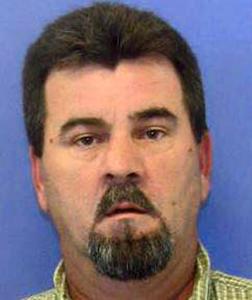 This undated driver's license photo provided by the Pennsylvania Department of Transportation shows Kevin Ewing of West Finley Township, Pa. Pennsylvania State Police say Ewing, a man free on bond while awaiting trial on charges he beat his wife Tierne Ewing while holding her captive for nearly two weeks, kidnapped her again at gunpoint Tuesday, Aug. 30, 2016, from a residence in West Finley Township, Pa., about 50 miles southwest of Pittsburgh along the West Virginia border. (Pennsylvania Department of Transportation via AP)