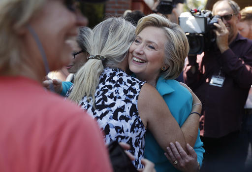 Clinton defends family foundation, says work will&nbsp;continue