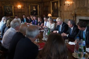 Britain's Prime Minister Theresa May, center right, holds a cabinet meeting at her country retreat Chequers in Wendover, England, Wednesday Aug. 31, 2016. May is discussing specific plans for the country to leave the European Union in a session meant to underscore Conservative party unity. (Stefan Rousseau/PA via AP)