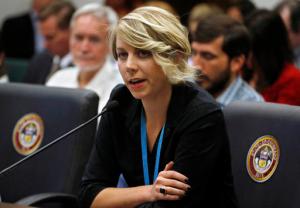 Dr. Andrea Hoopes of Children's Hospital gives testimony during a hearing of the Colorado state House Marijuana Cost-Benefit Analysis Intirim Committee, at the state Capitol, in Denver, Wednesday, Sept. 21, 2016. The panel of state lawmakers heard testimony on a range of issues Wednesday, including whether or not to give PTSD patients the ability to get a doctor's recommendation for marijuana, something many patient advocates have been seeking for more than a decade. While any vote would have no immediate legal effect, policy decisions by the interim legislative panels often carry significant weight when the full Legislature meets in January. (AP Photo/Brennan Linsley)