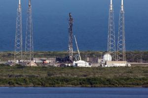 FILE - This Thursday, Sept. 8, 2016 file photo shows the damaged SpaceX launch complex 41 at Cape Canaveral Air Force Station in Florida. On Friday, Sept. 23, 2016, SpaceX said a breach in its rocket's helium system may have caused the devastating explosion three weeks ago at Cape Canaveral on Sept. 1. (Red Huber/Florida Today via AP)