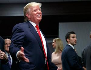 Republican presidential candidate Donald Trump smiles after speaking to an overflow room during a campaign rally, Tuesday, Sept. 6, 2016, in Greenville, N.C. (AP Photo/Evan Vucci)