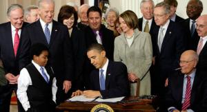 FILE - In this March 23, 2010, file photo, President Barack Obama signs the health care bill in the East Room of the White House in Washington. With the nation still divided over "Obamacare," President Barack Obama is laying out a blueprint for addressing unsolved problems with his signature health law, including a renewed call for a "public option" to let Americans buy insurance from the government. (AP Photo/J. Scott Applewhite, File)