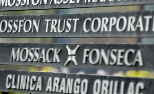 FILE - In this Monday, April 4, 2016 file photo, a marquee of the Arango Orillac Building lists the Mossack Fonseca law firm, in Panama City. Denmark will buy leaked data from a Panamanian law firm that helped customers open offshore companies to avoid paying taxes, the Scandinavian country's taxation minister said Wednesday, Sept 7, 2016. Karsten Lauritzen said Denmark's tax authorities had received an anonymous offer over the summer to acquire data from the so-called "Panama Papers" that could involve up to 600 people. The ministry said communication with the anonymous source was made via encrypted channels. (AP Photo/Arnulfo Franco, File)