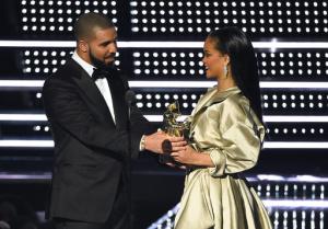 FILE - In this Aug. 28, 2016, file photo, Drake, left, presents the Michael Jackson Video Vanguard Award to Rihanna at the MTV Video Music Awards at Madison Square Garden in New York. Rihanna thanked Drake on Instagram Friday, Sept. 2, 2016, for his presentation, calling the rapper's speech "touching." (Photo by Charles Sykes/Invision/AP, File)
