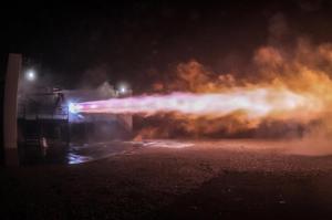 This Sept. 25, 2016 photo made available by SpaceX shows a test firing of the company's Raptor engine in McGregor, Texas. On Tuesday, Sept. 27, 2016, SpaceX founder Elon Musk announced his company's plan for travel to the planet Mars. The engine is being tested for use in the new spacecraft. (SpaceX via AP)