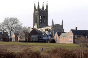 FILE - In this Jan. 7, 2016, file photo, buildings at St. George's School sit on a hill in Middletown, R.I. A report issued Thursday, Sept. 1, 2016, said that at least one in five girls who attended the elite Rhode Island boarding school in the 1970s was sexually abused by the same athletic trainer. (AP Photo/Steven Senne, File)