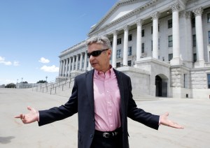 FILE - In this May 18, 2016 file photo, Libertarian presidential candidate, former New Mexico Gov. Gary Johnson leaves the Utah State Capitol after meeting with with legislators, in Salt Lake City. The day after political heavyweight Mitt Romney name-dropped him on Twitter, the former New Mexico governor seemed to reveal a hole in his foreign-affairs knowledge when he was befuddled by an otherwise routine question about the Syrian city of Aleppo. (AP Photo/Rick Bowmer, File)
