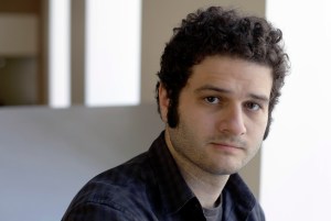 FILE-In this April 26, 2012 file photo, Dustin Moskovitz, a Facebook co-founder, poses outside of his office in San Francisco. Moskovitz says he is giving $20 million to help defeat Donald Trump, calling the Republican presidential candidate divisive and dangerous and his appeals to Americans who feel left behind "quite possibly a deliberate con."  (AP Photo/Eric Risberg)