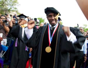 FILE - In this May 10, 2014, file photo, entertainer and entrepreneur Sean "Puff Daddy" Combs arrives to the 2014 Howard University graduation ceremony at Howard University in Washington. Combs announced a $1 million donation to the school on Sept. 23, 2016, during his concert in Washington. (AP Photo/Jose Luis Magana, File)