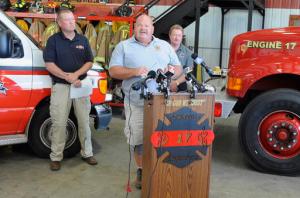 Fire Chief Billy McAdams, center, speaks with reporters about a school shooting during a news conference in Townville, S.C., on Thursday, Sept. 29, 2016. McAdams was among the first two officials to arrive on the scene of the shooting, which injured two students and a teacher at a rural elementary school. (AP Photo/Jay Reeves)