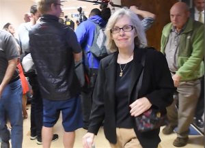 Former state epidemiologist Corinne Miller leaves court room after taking a plea agreement, at the 67th District Court in Flint, Michigan on Wednesday, Sept. 14, 2016. Former state epidemiologist Miller pleaded Wednesday to the misdemeanor neglect of duty charge in an investigation into Flints lead-contaminated water crisis. The deal with prosecutors drops felony misconduct and conspiracy charges. (Daniel Mears/The Detroit News via AP)