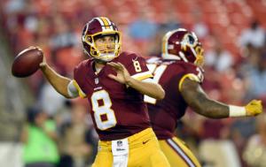 Washington Redskins quarterback Kirk Cousins (8) looks to pass during the first half of an NFL preseason football game against the Buffalo Bills, Friday, Aug. 26, 2016, in Landover, Md. (AP Photo/Nick Wass)
