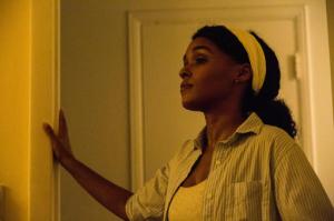 This image released by A24 Films shows Janelle Monae in a scene from the film, "Moonlight."  The film is  a poetic coming-of-age tale told across three chapters about a young gay black kid growing up in a poor, drug-ridden neighborhood of Miami. (David Bornfriend/A24 via AP)