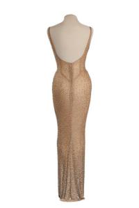 This undated photo provided by Julien's Auctions shows the back view of the flesh-colored dress Marilyn Monroe wore during her rendition of "Happy Birthday" to President John F. Kennedy. Julien’s Auctions is offering the sequined stunner in Los Angeles on Nov. 17, 2016. (Julien's Auctions via AP)