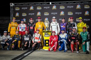 The drivers who have made it into the Chase pose after the NASCAR Sprint Cup auto race at Richmond International Raceway in Richmond, Va., ealry Sunday, Sept. 11, 2016. Standing, from left, are Kyle Busch, Tony Stewart, Kurt Busch, Joey Logano, Carl Edwards, Denny Hamlin, Kevin Harvick and Matt Kenseth. Kneeling are, from left, Brad Keselowski, Chris Buescher, Martin Truex Jr., Chase Elliott, Kyle Larson, Jimmie Johnson, Austin Dillon and Jamie McMurray (AP Photo/Chet Strange)
