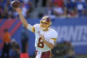 In this photo taken Sept. 25, 2016, Washington Redskins quarterback Kirk Cousins (8) throws a pass during the second half of an NFL football game against the New York Giants in East Rutherford, N.J. A year after so much success in the red zone, Kirk Cousins and the Washington Redskins are about as bad as it gets in the NFL from inside the 20 right now. Heading into the Sunday, Oct. 2, 2016, game against the visiting Cleveland Browns, the Redskins (1-2) rank 31st out of 32 teams in turning red-zone possessions into touchdowns, going just 3 for 14 so far, a success rate of 21 percent. (AP Photo/Bill Kostroun)
