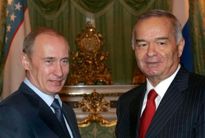 FILE-In this file photo taken on Wednesday, Feb. 6, 2008, Russian President Vladimir Putin and Uzbekistan's President's Islam Karimov, right, meet in Moscow, Russia. The Interfax news agency Friday Sept. 2, 2016 cites an Uzbek government statement saying President Islam Karimov is dead. (Vladimir Rodionov, Sputnik, Kremlin Pool Photo via AP)
