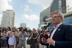 Russian opposition figure, former Russian Prime Minister Mikhail Kasyanov, chairman of the opposition People's Freedom Party, or Parnas, speaks to a group of people calling themselves 'Defenders of the Russian White House' at a memorial for three men killed in the August 1991 hard line Communist coup attempt, during a ceremony marking the 25th anniversary of the failure of the coup in downtown Moscow, Russia, Monday, Aug. 22, 2016. Many Russians who opposed the coup have grown disillusioned with democracy, which they have come to associate with the hardships of the initial years of the dismantling of the Soviet state and a transition to the market economy. (AP Photo/Ivan Sekretarev)