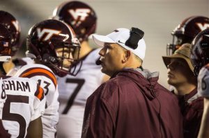 Virginia Tech head coach Justin Fuente speaks to his team during an NCAA college football game against North Carolina in Chapel Hill, N.C., Saturday, Oct. 8, 2016. (AP Photo/Ben McKeown)