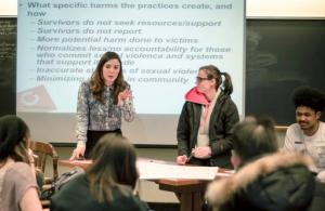 In this April 8, 2016, photo provided by Breakthrough, Columbia University graduate student Savannah Badalich leads a Breakthrough Campus Catalyst Training with student activists at Syracuse University in Syracuse, N.Y., for Sexual Assault Awareness Month. When news broke that Donald Trump, the Republican nominee for president, had bragged of groping women, and then trivialized it as “locker room talk,” it felt to some students like a repudiation of their efforts. (Jacob Greenfield/Breakthrough via AP)