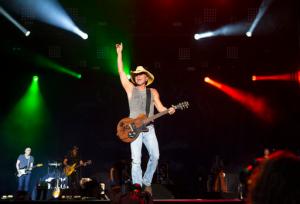 FILE - In this April 3, 2016, file photo, Kenny Chesney performs at the 4th Annual ACM Party for a Cause Festival at the Las Vegas Festival Grounds in Las Vegas. Chesney will receive the Pinnacle Award during the 50th annual Country Music Association Awards, joining Garth Brooks and Taylor Swift as the only recipients. The CMA Awards will air live from the Bridgestone Arena in Nashville on Nov. 2 on ABC. (Photo by Eric Jamison/Invision/AP, File)