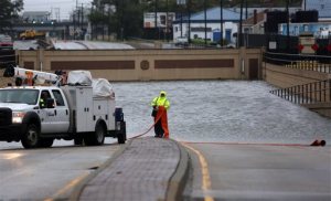 The underpass on E Brambleton Ave  in Norfolk, Va., is completely flooded after heavy rains and high tides from the remnants of Hurricane Matthew early Sunday morning, Oct. 9, 2016. Forecasters said North Carolina and Virginia could get even more rain and warned of the danger of life-threatening flooding through Monday night. (Steve Earley/The Virginian-Pilot via AP)