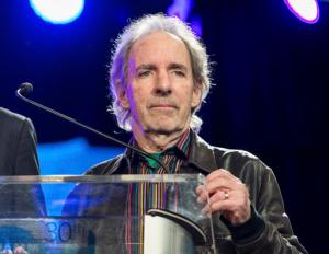 FILE - In this Jan. 24, 2015 file photo, Harry Shearer appears at the 30th annual TEC Awards during the 2015 National Association of Music Merchants (NAMM) show in Anaheim, Calif. Shearer filed a lawsuit in a federal court in Los Angeles on Monday, Oct. 17, 2016, against the French studio Vivendi S.A. over profits from the 1984 hit “This Is Spinal Tap” and its merchandise and music. (Photo by Paul A. Hebert/Invision/AP, File)