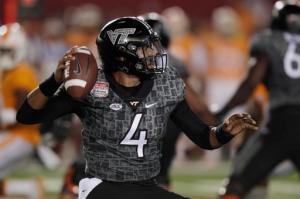 FILE - In this Sept. 10, 2016, file photo, Virginia Tech quarterback Jerod Evans looks to pass against Tennessee during the first half of an NCAA college football game at Bristol Motor Speedway, in Bristol, Tenn. Evans has thrown 13 touchdown passes with one interception entering Saturday's trip to No. 17 North Carolina. (AP Photo/Wade Payne, File)