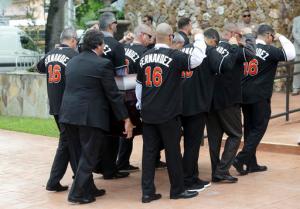Pallbearers wear a No. 16 jersey in honor of Miami Marlins pitcher Jose Fernandez as they carry his casket for a memorial service at St. Brendan's Catholic Church, Thursday, Sept. 29, 2016, in Miami. Fernandez was killed in a boating accident Sunday along with two friends. (AP Photo/Lynne Sladky)