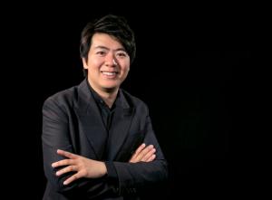 FILE - In this Oct. 21, 2015 file photo, Chinese concert pianist Lang Lang poses for a photograph in New York. The Chinese superstar has recorded a new cross-over album in which he tries to capture the spirit of New York, including doing a cover of “Empire State of Mind,” by Jay Z. (AP Photo/Kathy Willens, File)