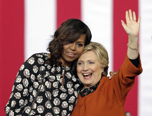 Trump hits ‘corrupt’ Hillary Clinton; Mrs. Obama hugs&nbsp;her