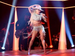 This Oct. 22, 2016 photo released by NBC shows Lady Gaga performing on "Saturday Night Live," in New York. Lady Gaga released her latest album, "Joanne," on Friday. (Will Heath/NBC via AP)