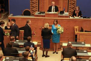 Kersti Kaljulaid, center, is congratulated on being elected a new president in the Estonian parliament in Tallinn, Estonia, Monday, Oct. 3, 2016. Estonia finally has chosen a new president, who will be the Baltic country’s first female leader. After two failed votes and weeks of heated debate, lawmakers on Monday unanimously elected European Union accountant Kersti Kaljulaid. (AP Photo/Vitnija Saldava)