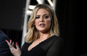 FILE - In this Jan. 6, 2016, file photo, Khloe Kardashian participates in the panel for "Kocktails with Khloe" at the FYI 2016 Winter TCA in Pasadena, Calif. Kardashian said on the "Ellen DeGeneres Show" in an interview broadcast on Tue., Oct. 11, 2016, that her older sister, Kim Kardashian West, is "not doing that well" more than a week after being held up during a Paris jewelry heist. (Photo by Richard Shotwell/Invision/AP, File)